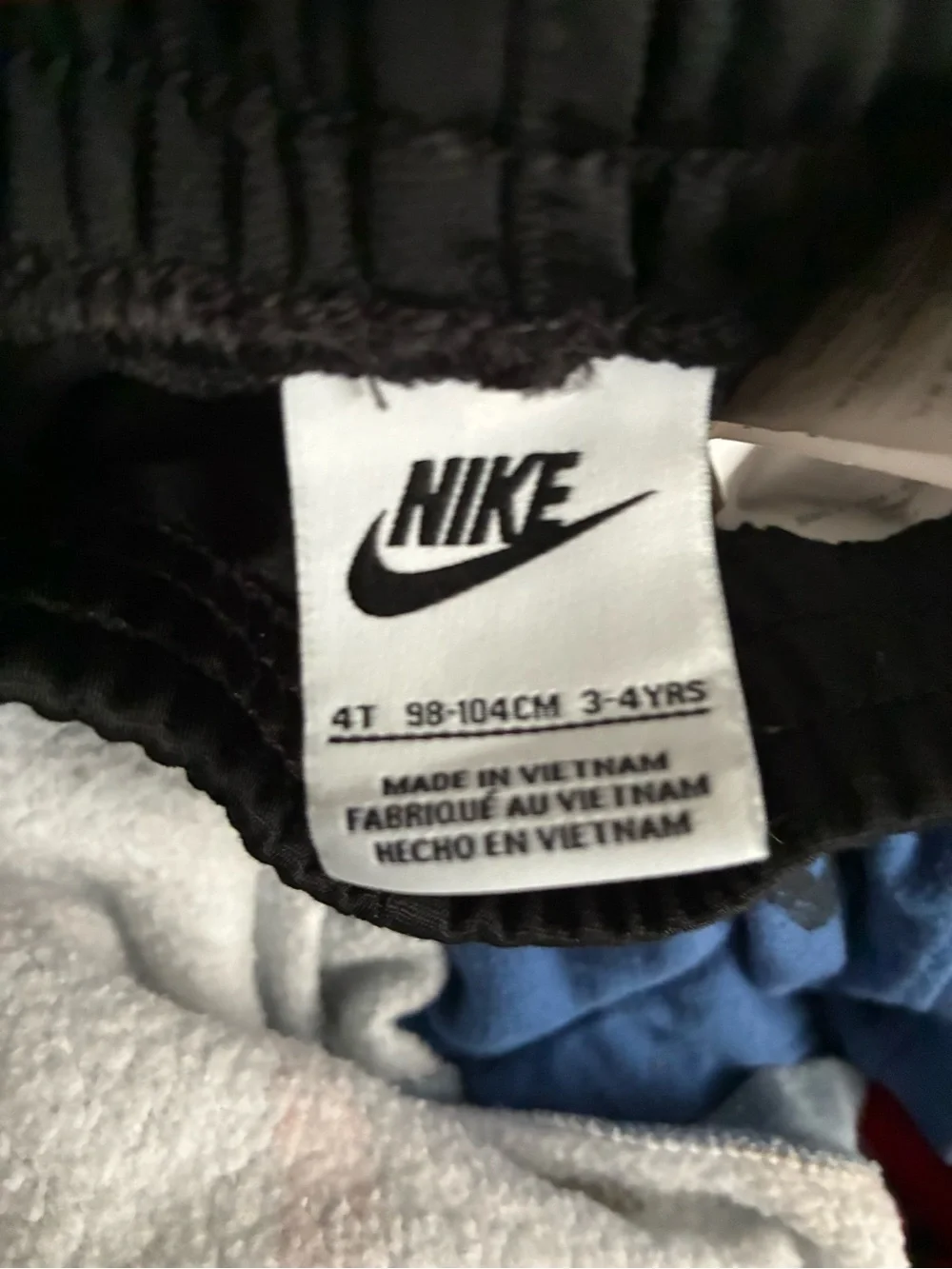 Nike Black Joggers with White Logo Tape